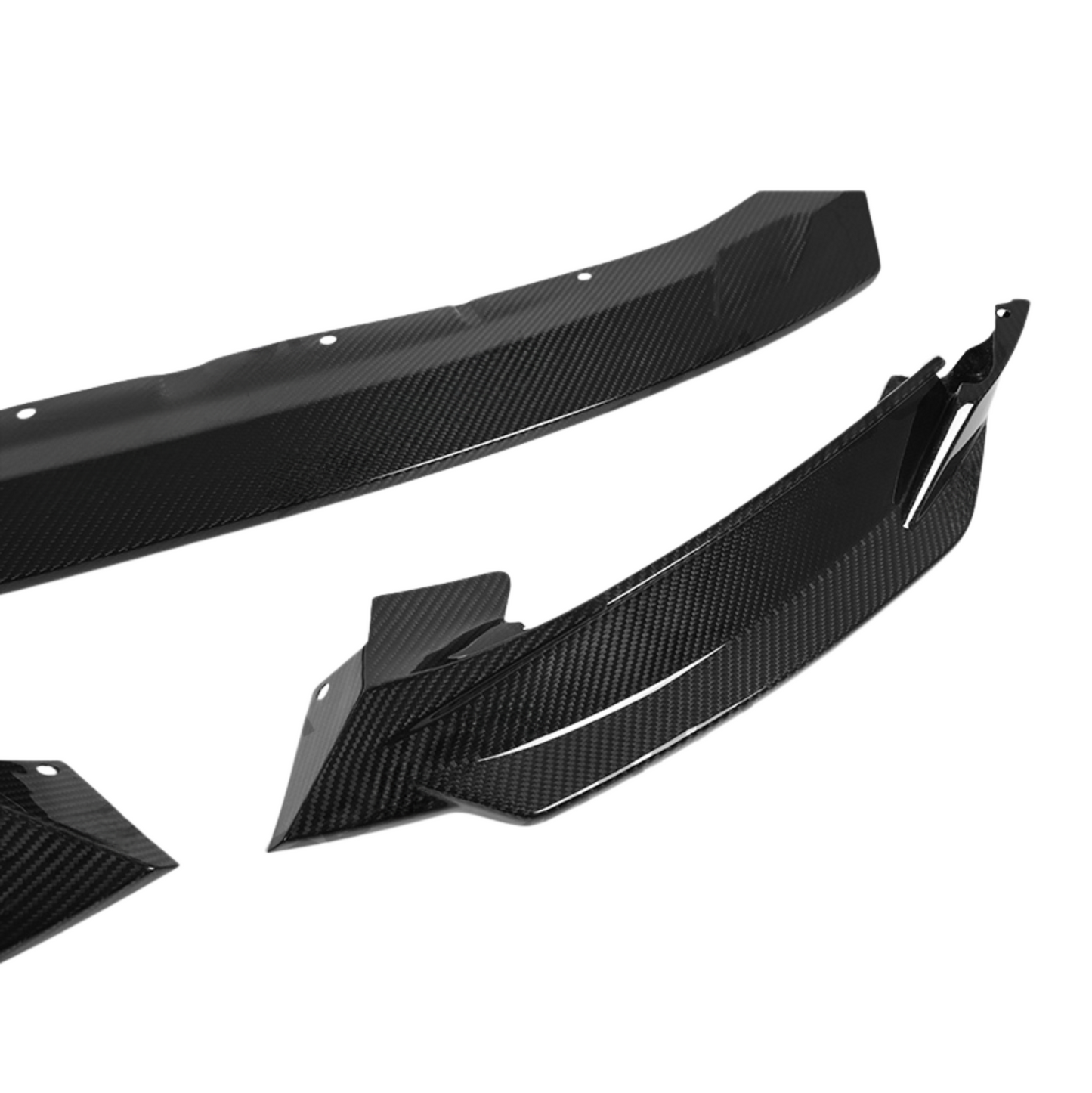 Carbon fiber car parts on a white background