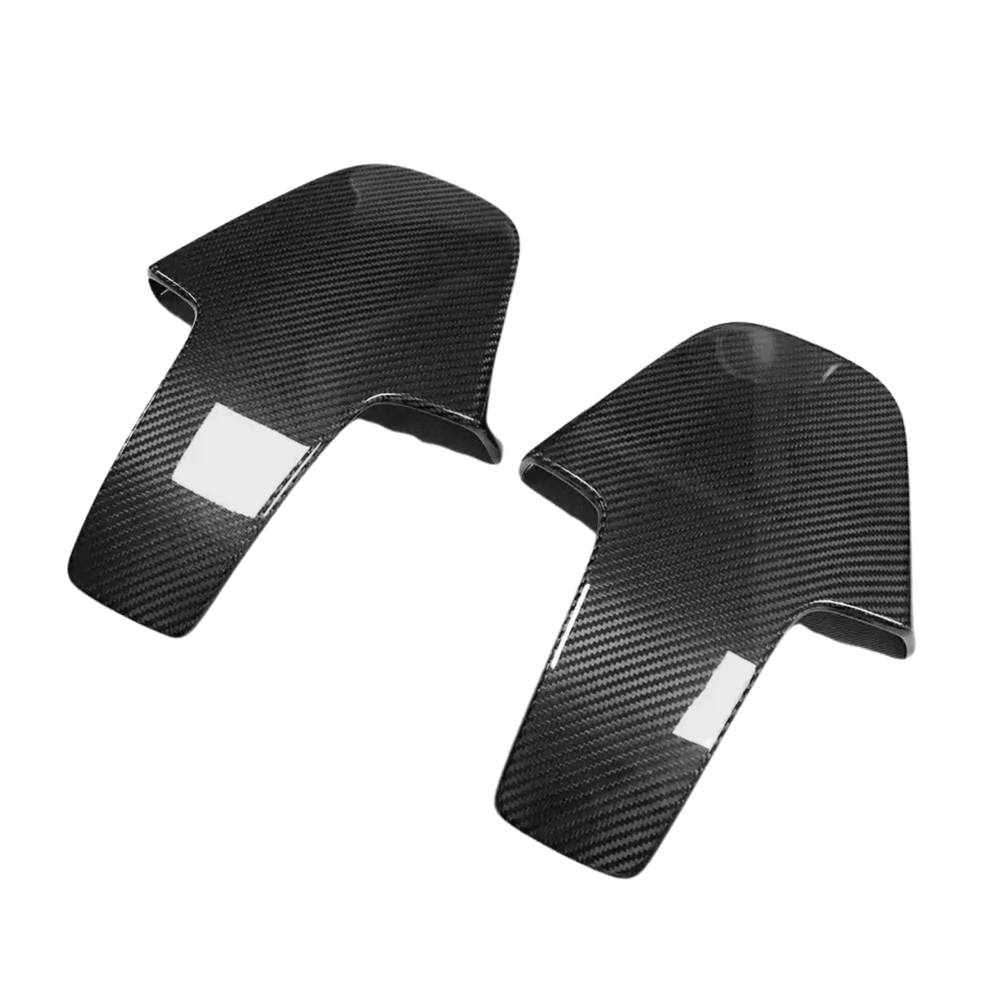 Two black carbon fiber headrest backs