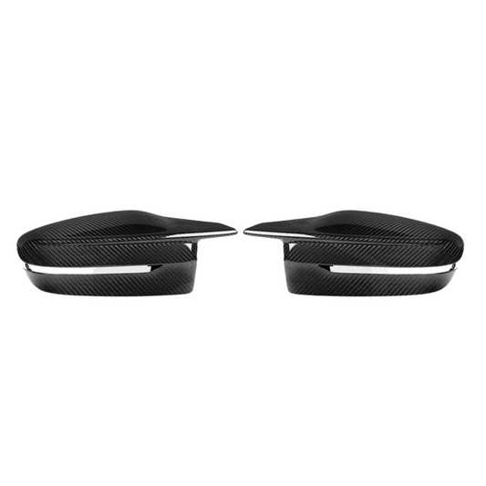 Two black carbon fiber mirror caps on a white background